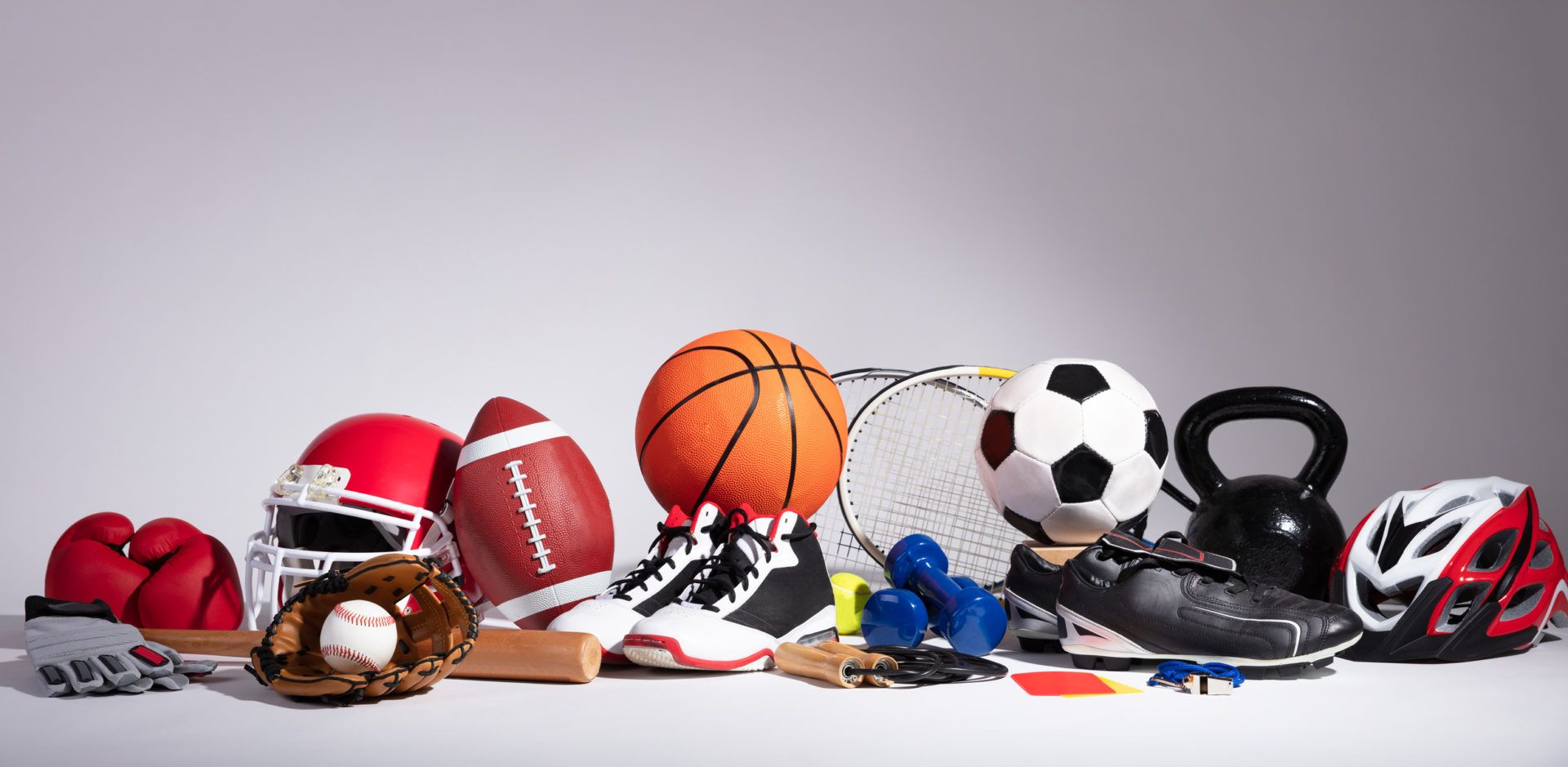 Close-up Of Sport Balls And Equipment