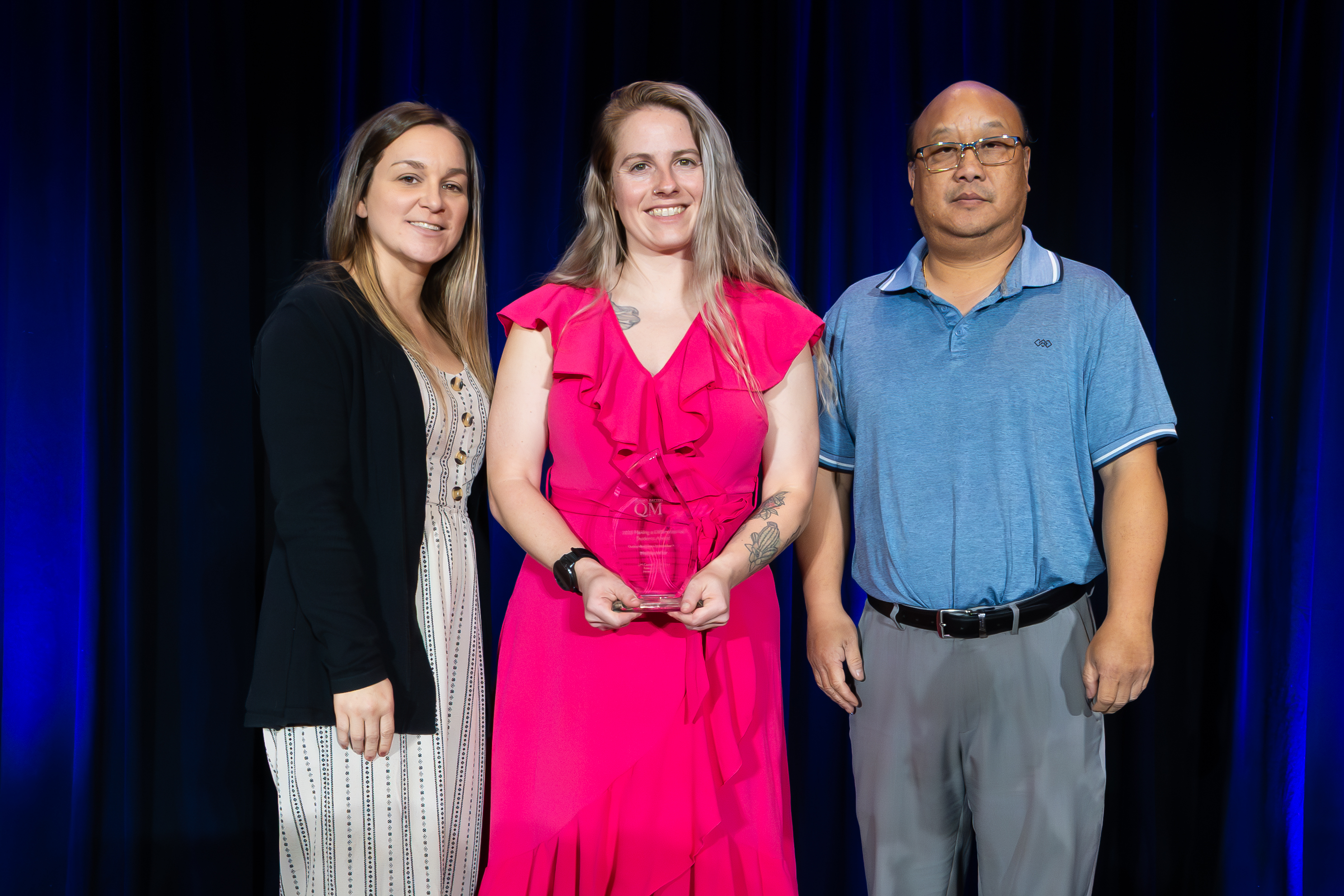 Marisa Weir of Michigan Virtual with colleagues of instructional design team at QM Connect Conference.